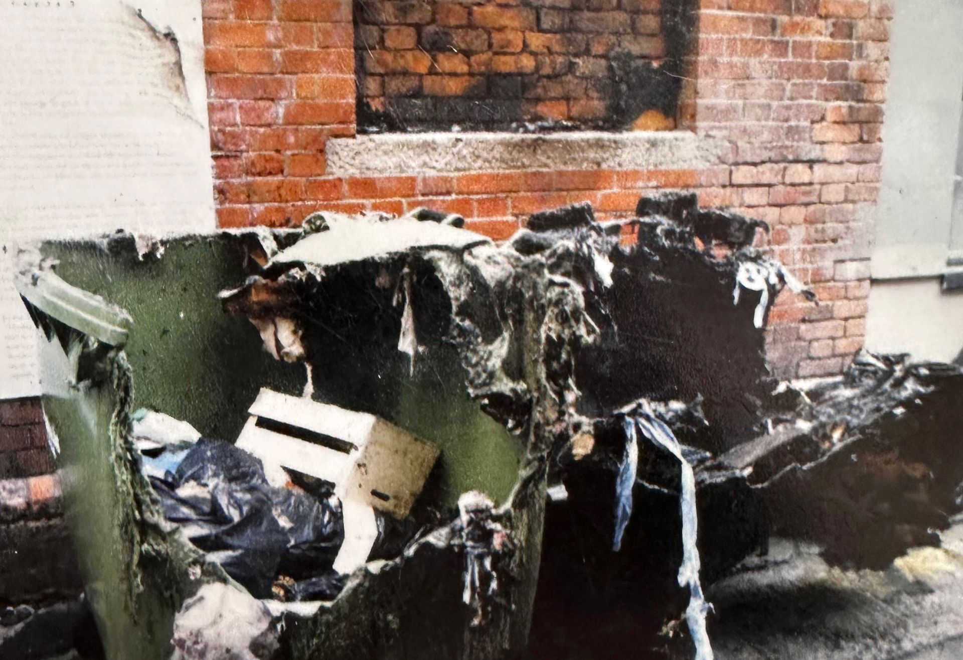 Burnt out bins and filth. Laneways neglected by Dublin City