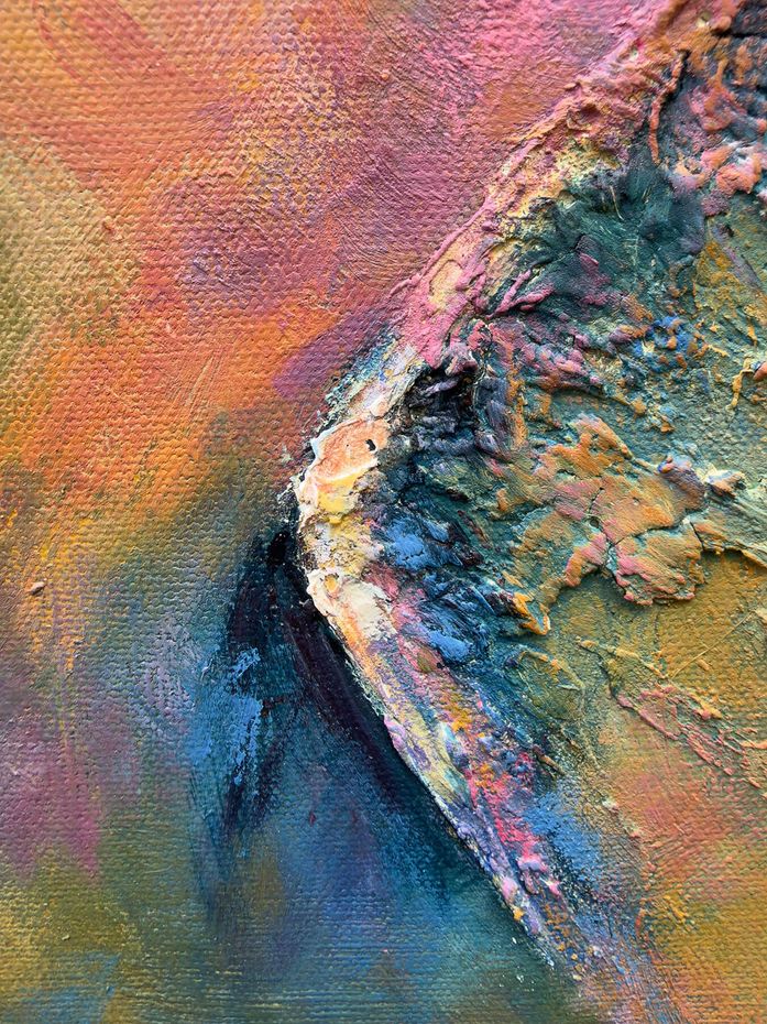 Close-up detail of layered acrylic and plaster showing a raised broken shoulder edge in pink, blue, ochre and green