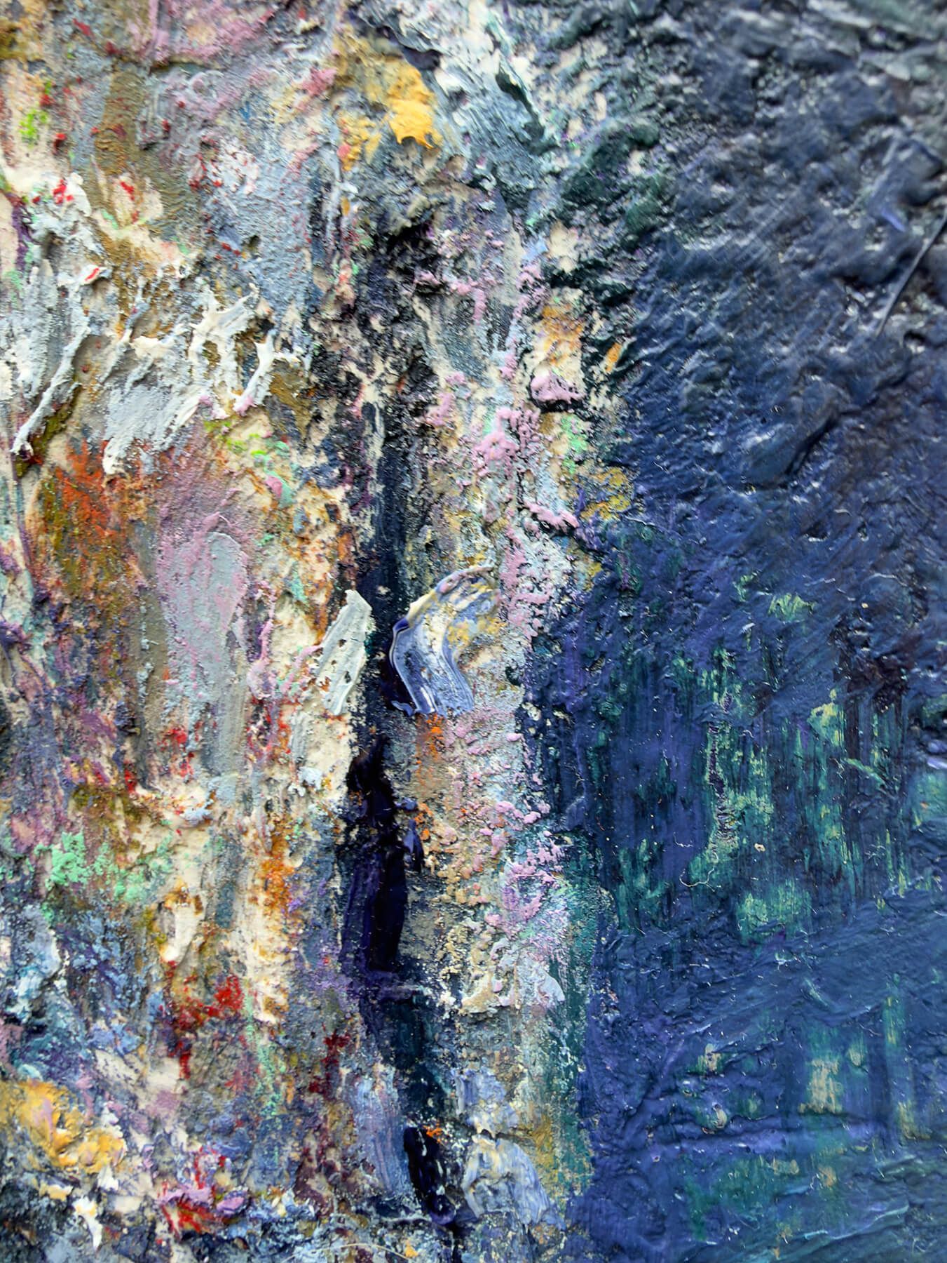 Close-up detail of dense acrylic and plaster with pale, pink, blue and ochre passages against a dark blue-green background.