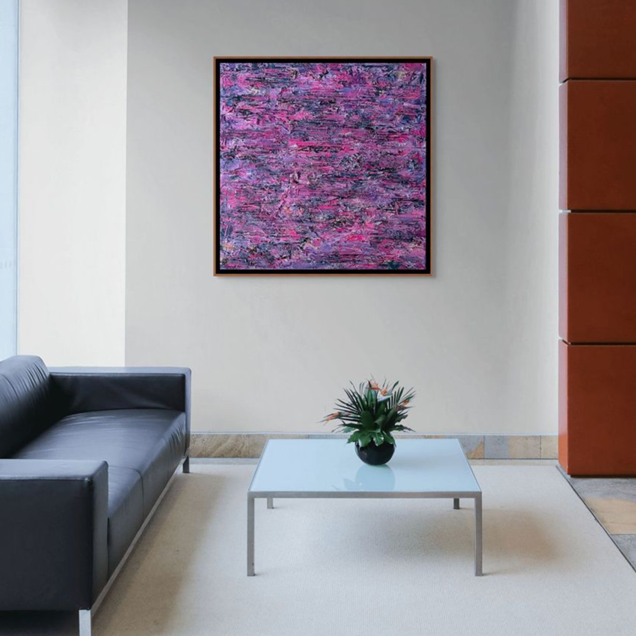 Large original Anthony Carey painting displayed above a sofa, showing how scale can anchor a living room wall.
