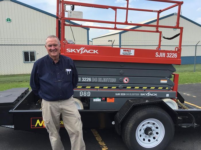 Client With Orange Truck | Viroqua, WI | Bruce Hill, LLC