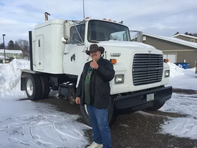 Client With Truck | Viroqua, WI | Bruce Hill, LLC