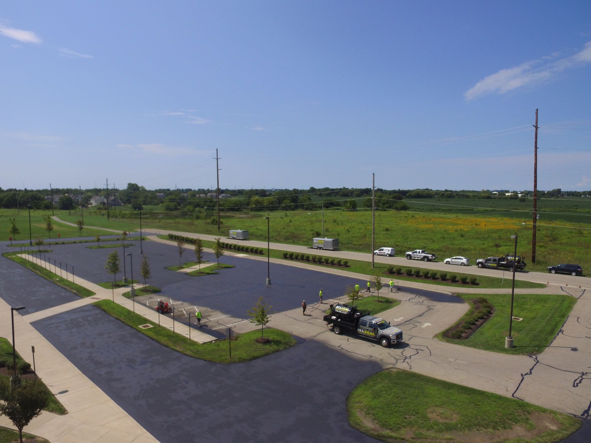 newly sealcoated commercial parking lot