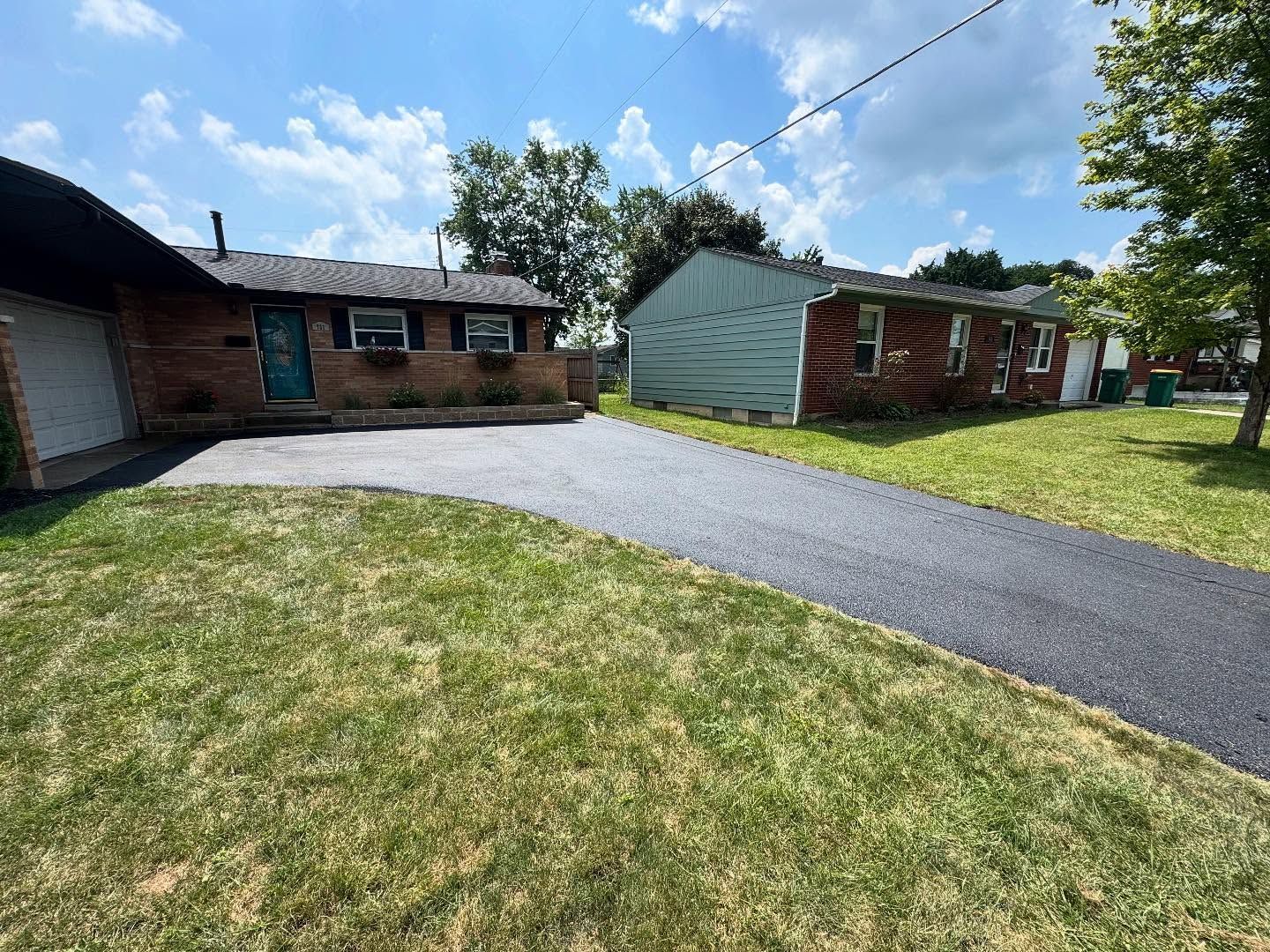 newly sealcoated commercial parking lot
