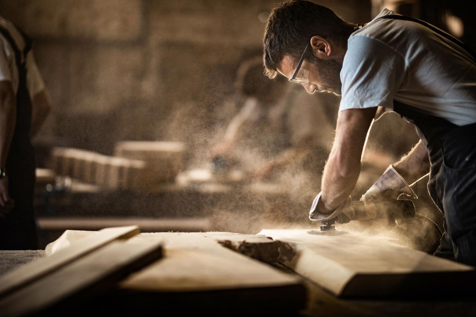 Carpenter using sander | Adelaide, SA | Shopfitting Industries