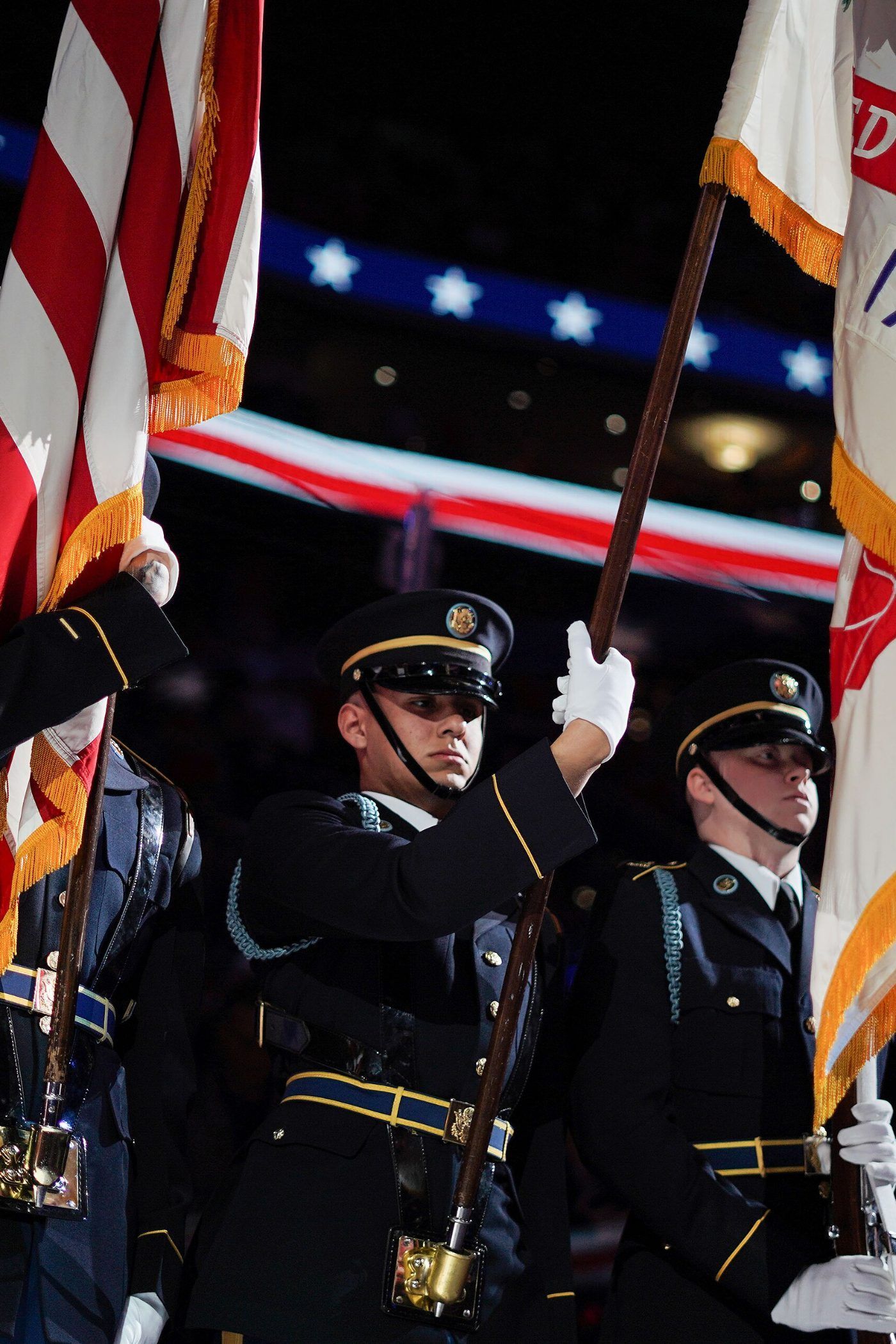 United States honor guard members at present arms
