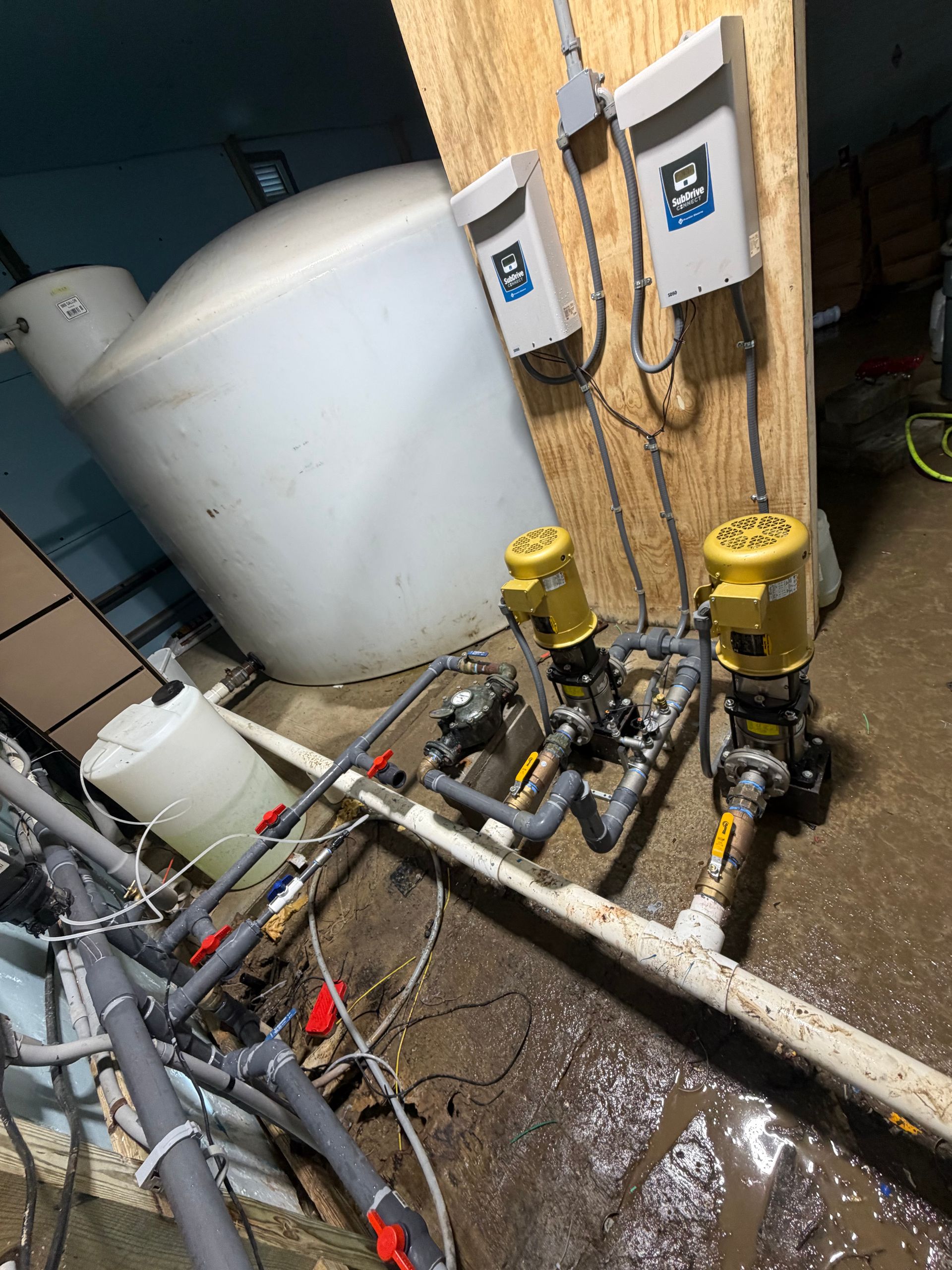 Twin booster pumps with VFD drives to supply constant water pressure to a mobile home park.