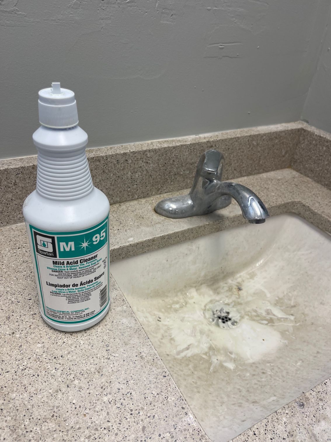 A white spray bottle labeled
