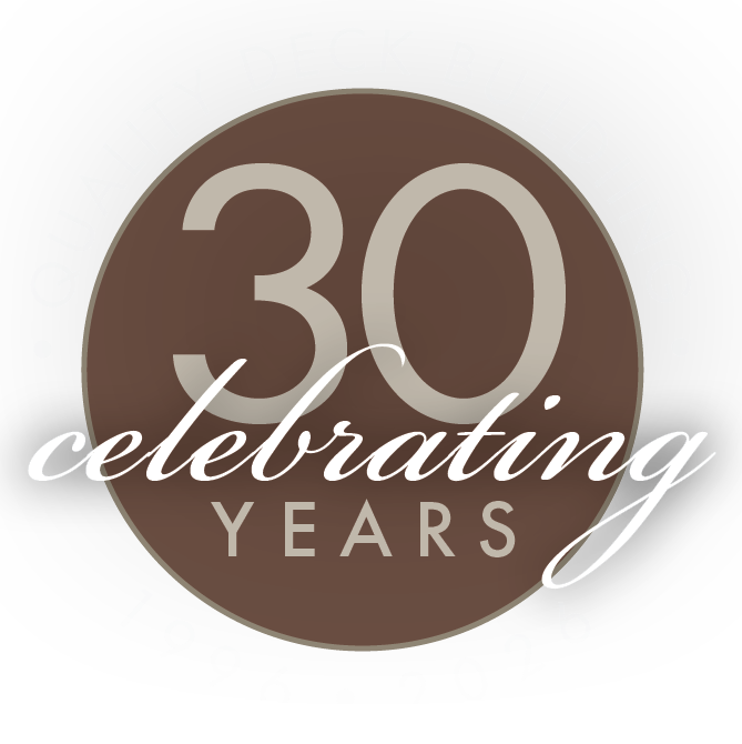 30th anniversary badge with brown circle and “celebrating years” text