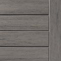 Gray wood-paneled surface with horizontal slats and a vertical border on the right