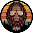 Stylized ape face with LOVE LOUDER sunglasses against a sunset-striped forest background and “OUTSIDER” text.