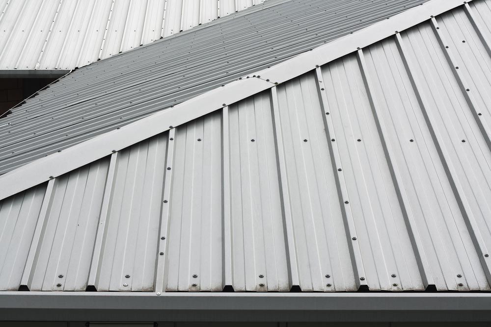 Metal Roofing On Commercial Construction Of Modern Building Complex — Delivering Quality Building Supplies in Barraba, NSW