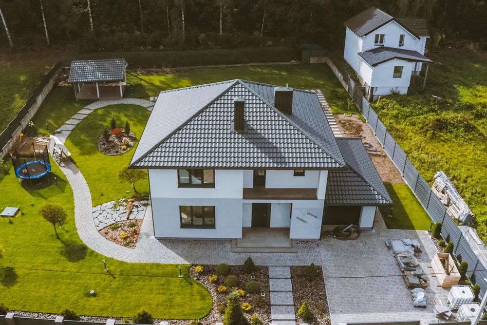 House With A Gray Metal Roof — Delivering Quality Building Supplies in Barraba, NSW