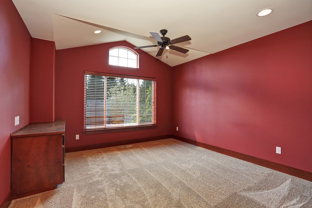 Room With Red Interior Paint — Delivering Building Supplies in Gunnedah, NSW