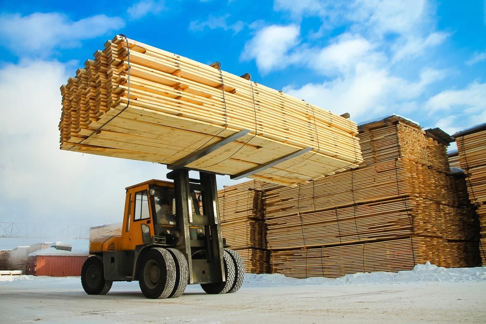 Machine Is Lifting Lumber On A Wood Factory — Arrange a Special Order in Tamworth, NSW