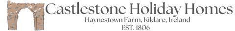 Castlestone Holiday Homes logo with tan stone arch and text on white background