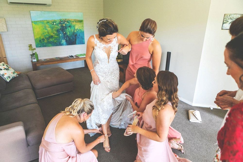 A Group of Women Are Helping a Bride Get Ready for Her Wedding — Lakeview Luxury Retreat in Canobolas, NSW