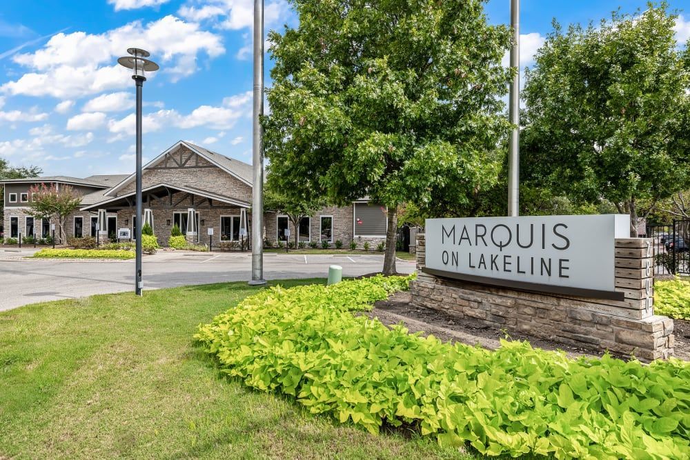 a sign in front of a building at Marquis on Lakeline in Cedar Park, TX.