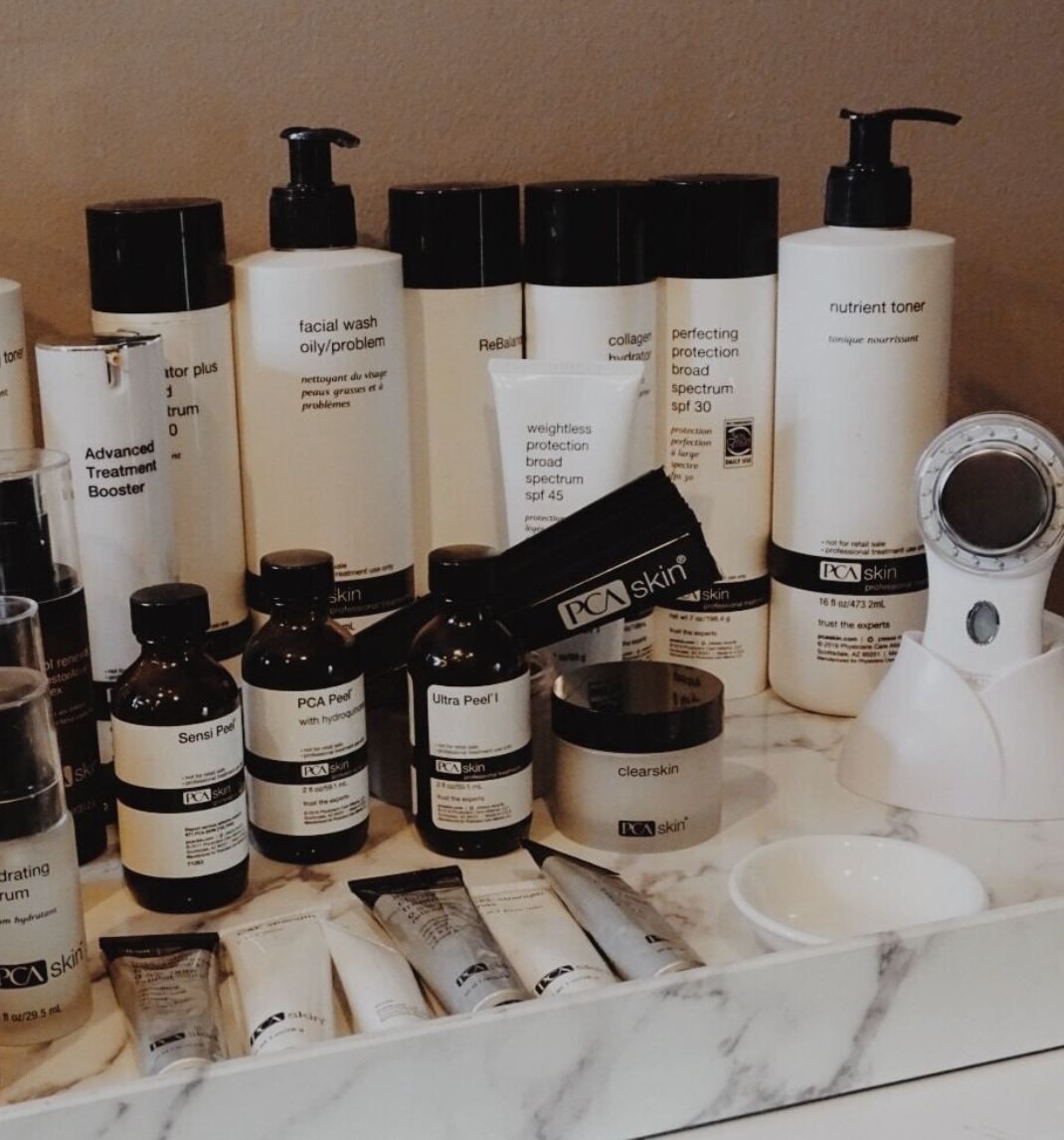 A bunch of lotion bottles including one that says icy skin
