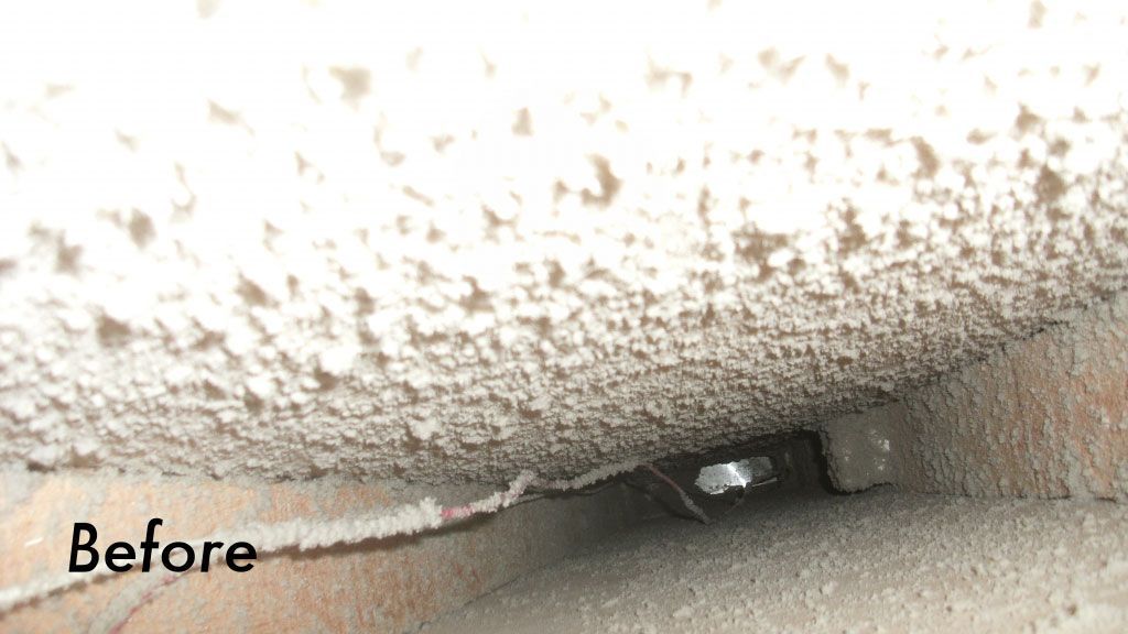 A picture of a dirty air vent before being cleaned.