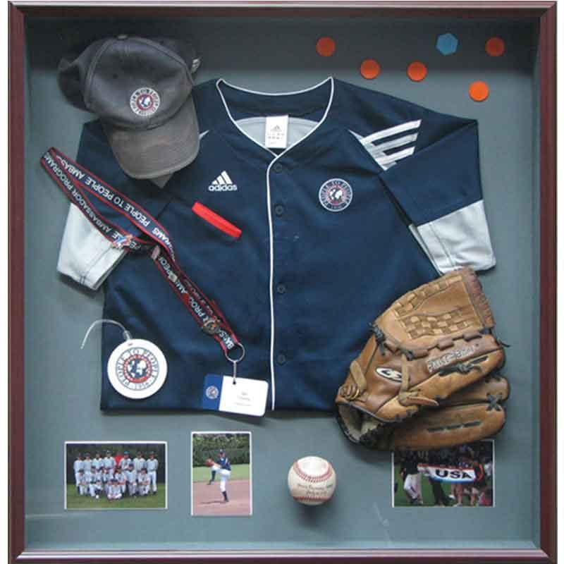A baseball jersey is displayed in a display case