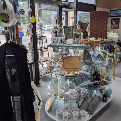 A store filled with lots of items including coffee mugs