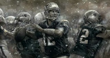 A group of football players are playing a game in the snow.