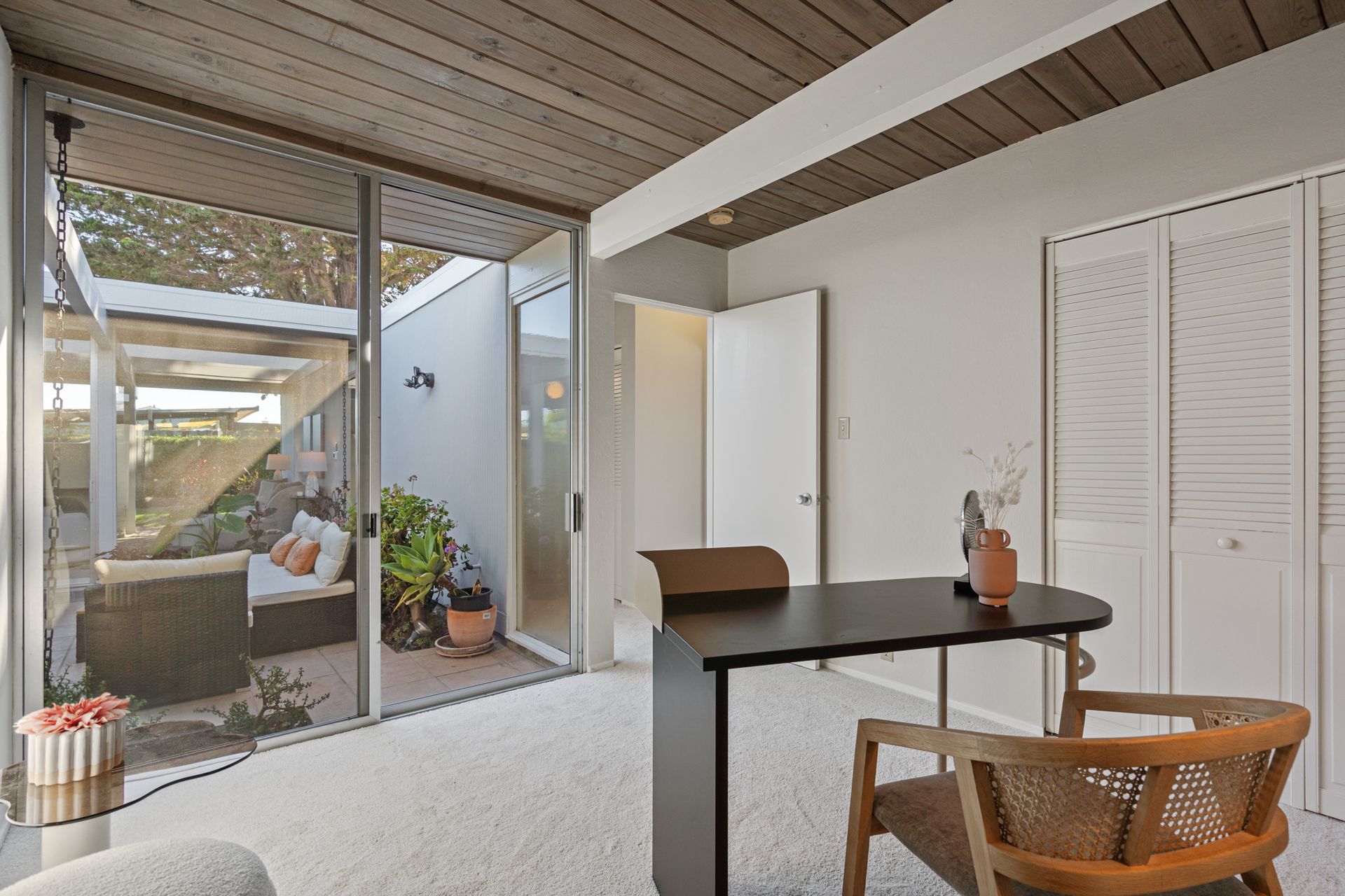 A room with a desk and chair in it
