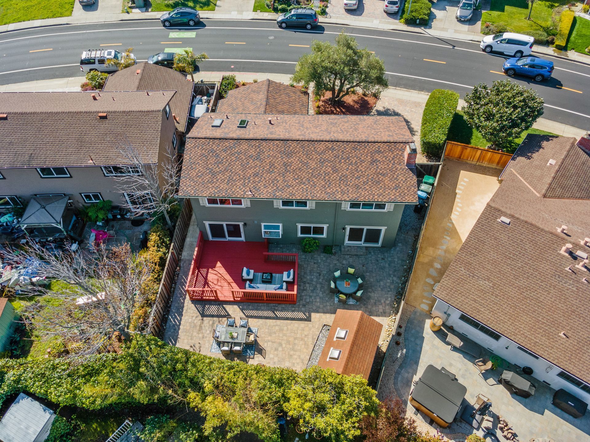 An aerial view of a house in a residential area