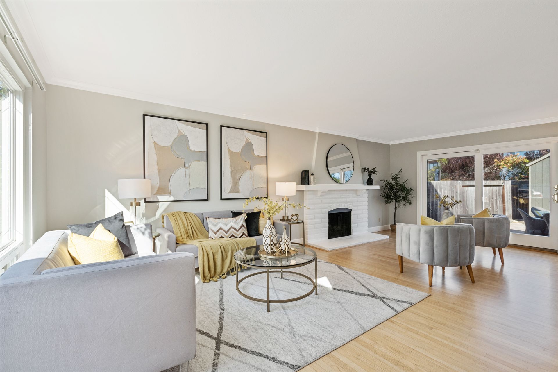 A living room filled with furniture and a fireplace.