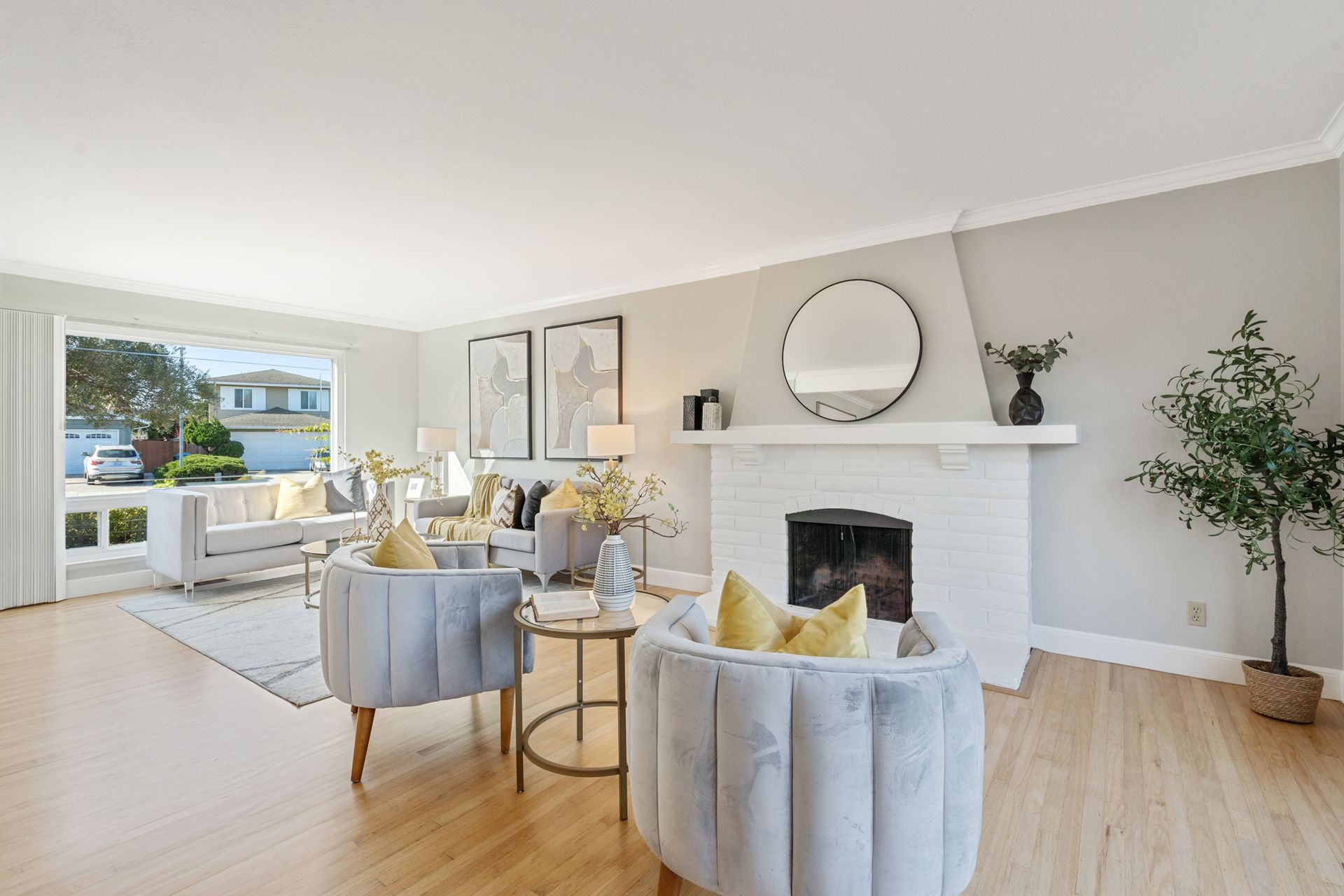 A living room filled with furniture and a fireplace.