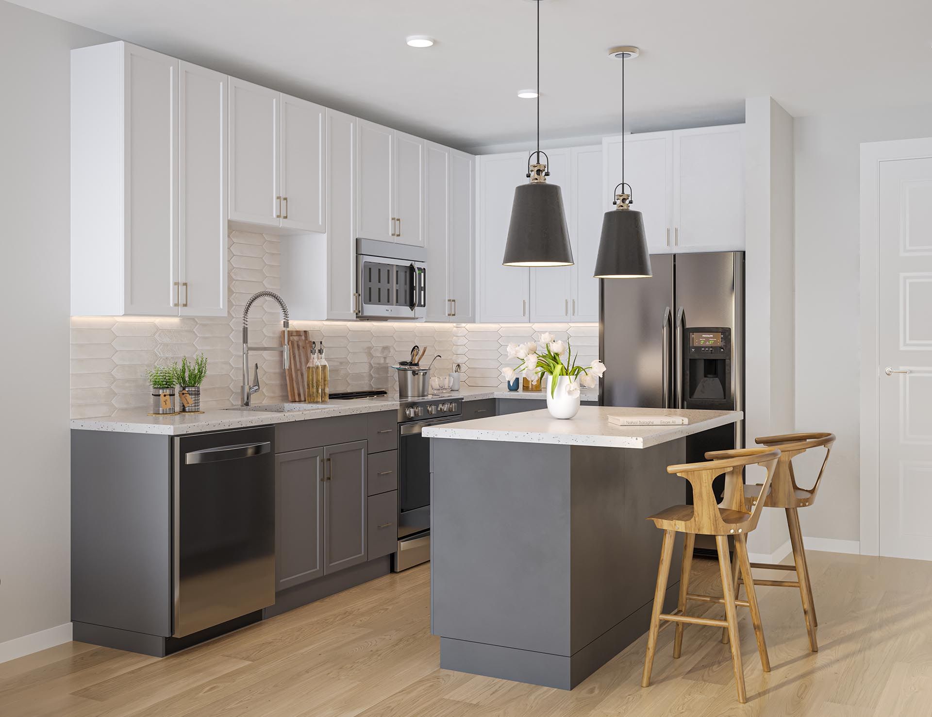 A kitchen with white cabinets , stainless steel appliances , and a large island.