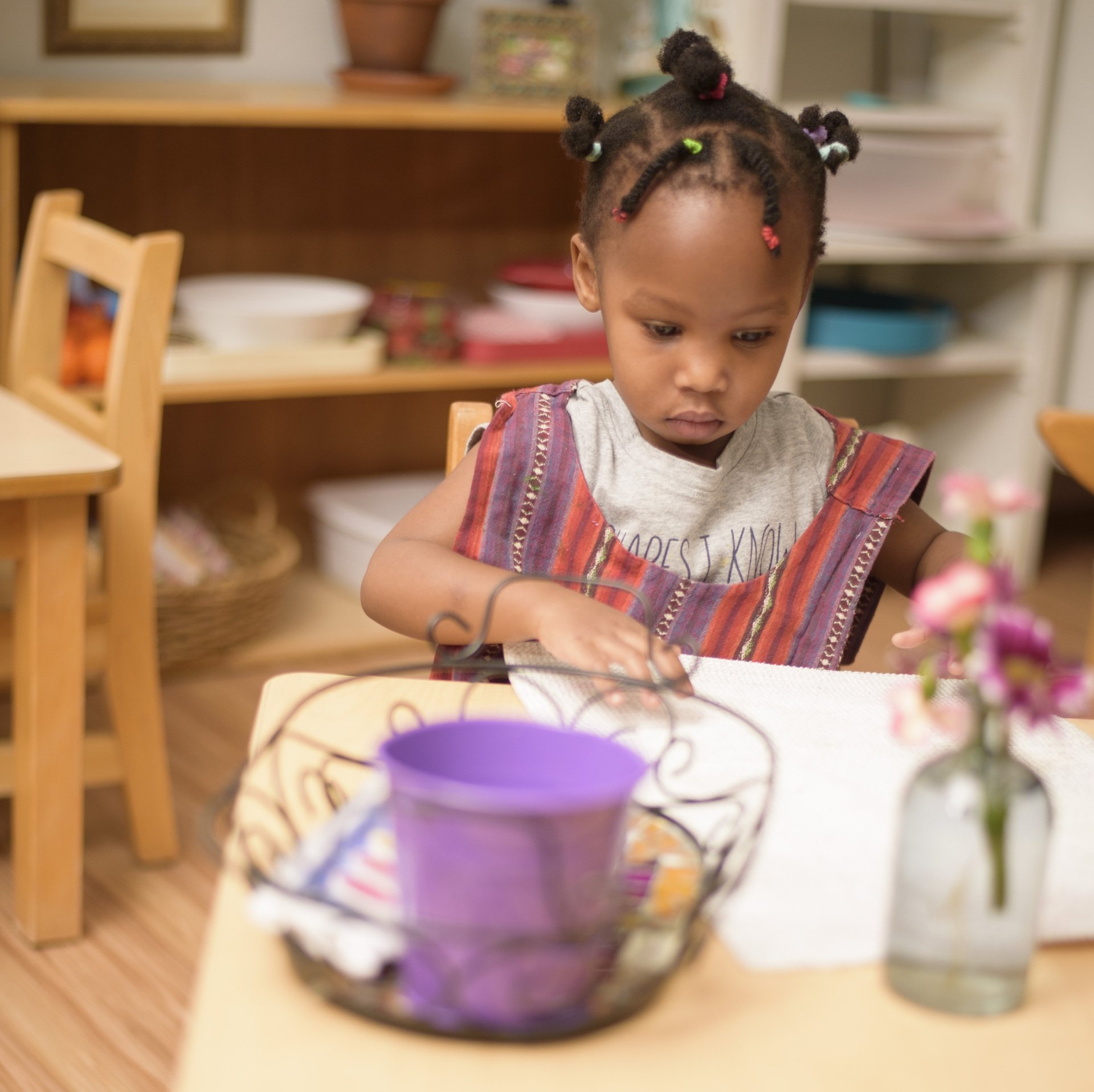 Child working with Montessori Materials