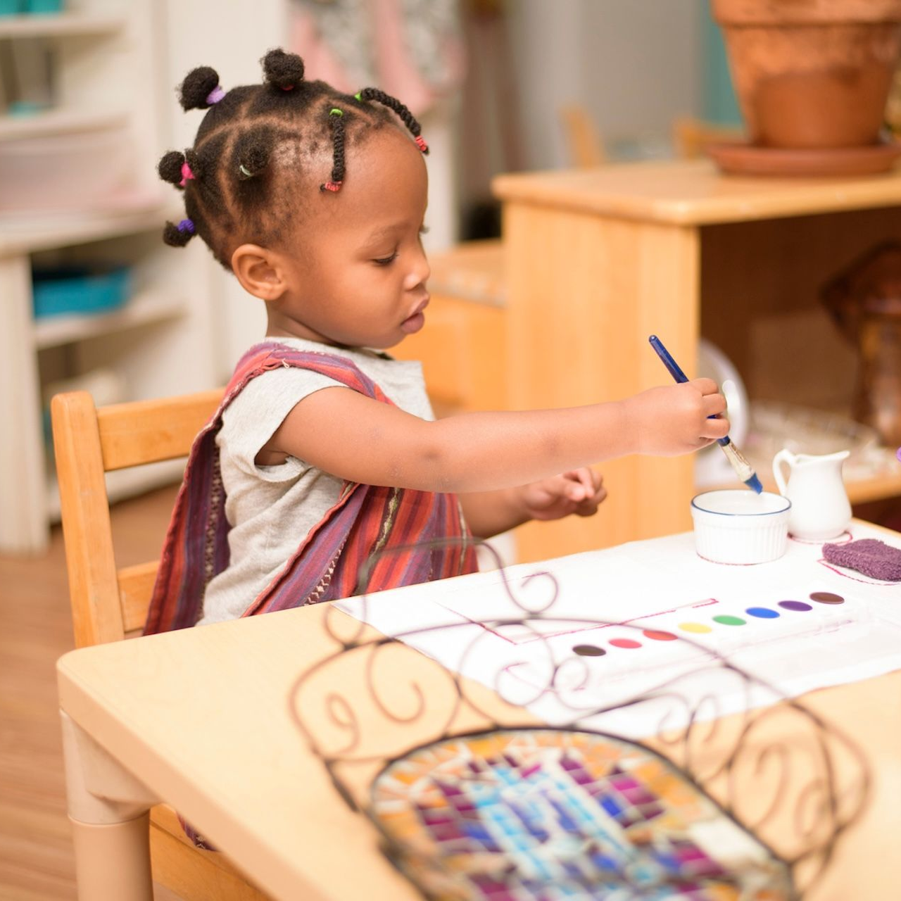child working with montessori materials