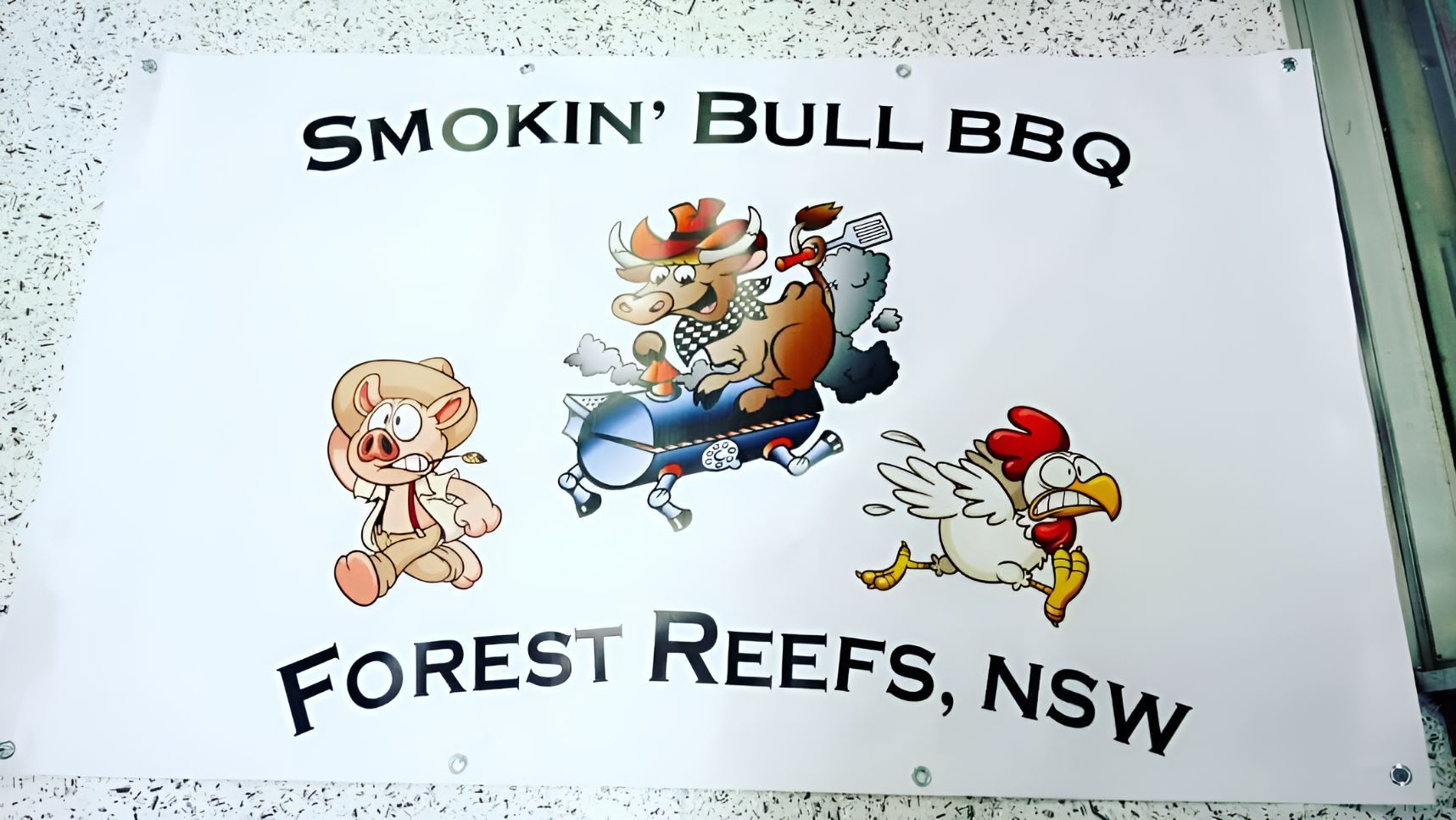 A Sign That Says Smokin' Bull Bbq Forest Reefs Nsw — Central West Trophies & Embroidery In Orange, NSW