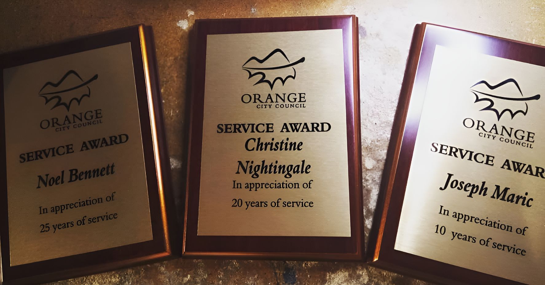 Three Plaques for Service Awards Are Sitting on a Table — Central West Trophies & Embroidery In Orange, NSW