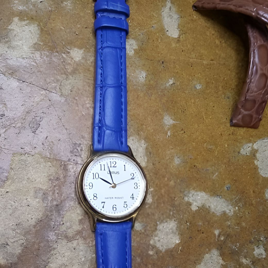 A Watch With a Blue Band and a White Face — Central West Trophies & Embroidery In Orange, NSW