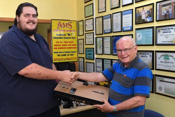 ams computer repair staff by desk