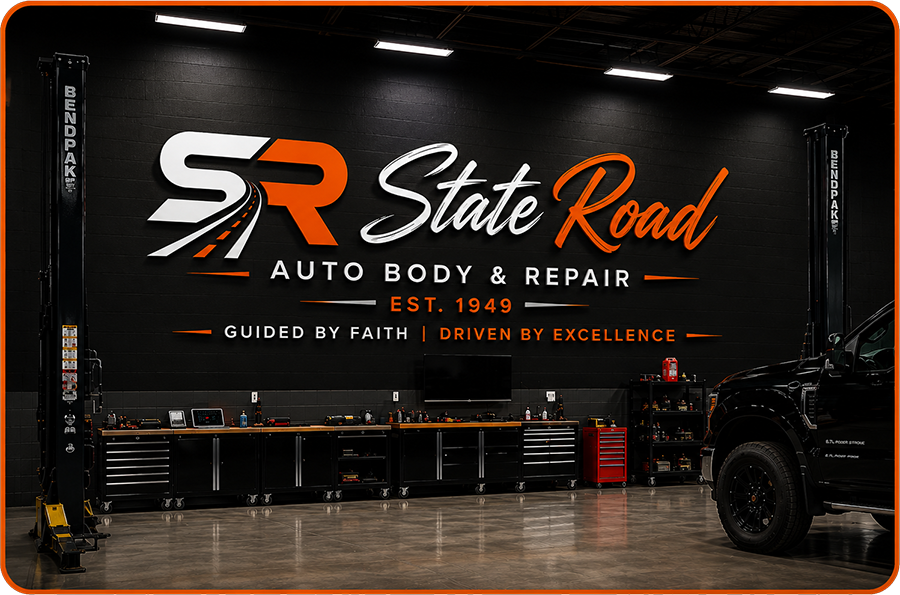 Black wall with logo on the wall | Auto Body & Repair Est. 1949 | State Road Auto Body & Repair