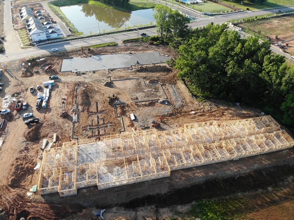 An aerial view of a large building under construction