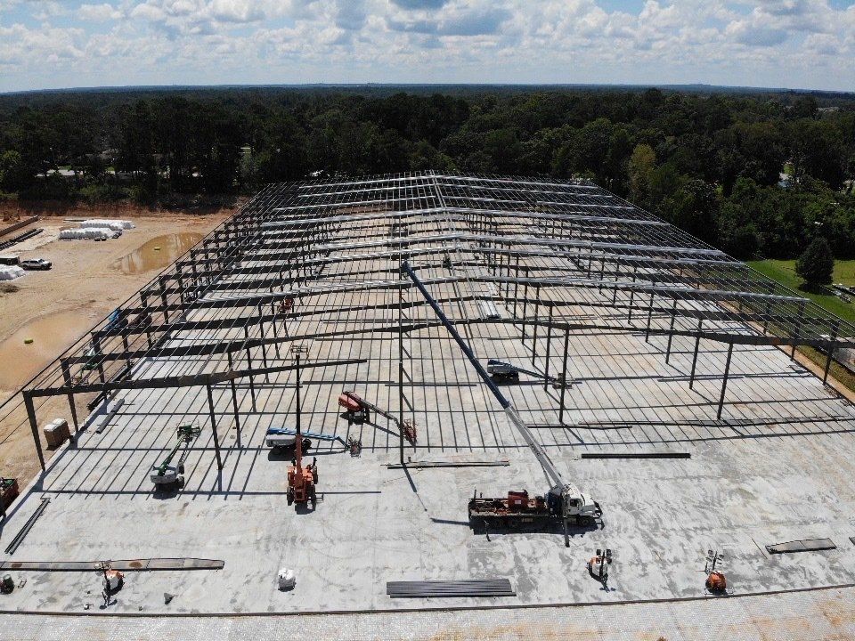 An aerial view of a large building under construction