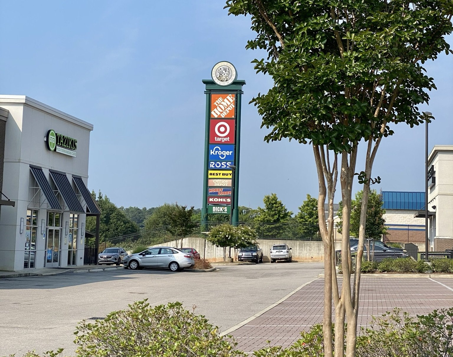 A parking lot with a sign that says home depot on it