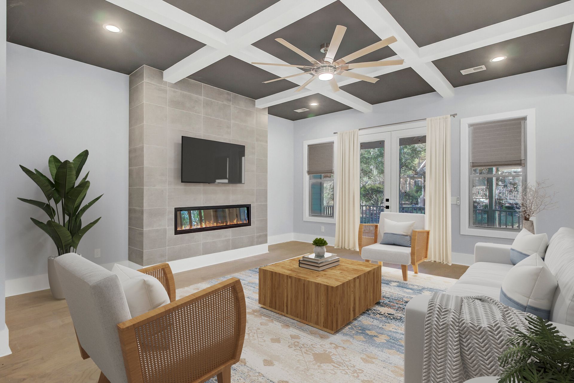 A living room with a fireplace , couch , chairs , coffee table and television.