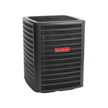 A goodman air conditioner is sitting on a white surface.