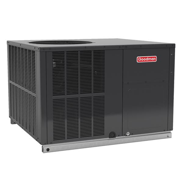 A goodman air conditioner is sitting on a white surface.