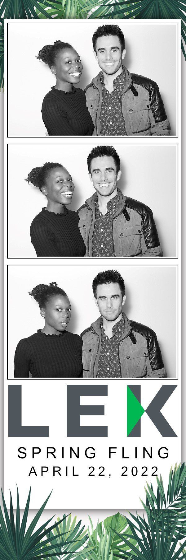 A man and a woman are posing for a picture in a photo booth.