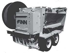 A grey FINN hydroseeder trailer with a large hose reel on the side, designed for soil stabilization and landscape work.