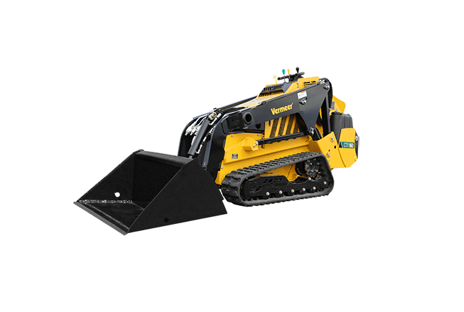 A yellow and black stand-on tracked skid steer loader with a front bucket, isolated on a white background.