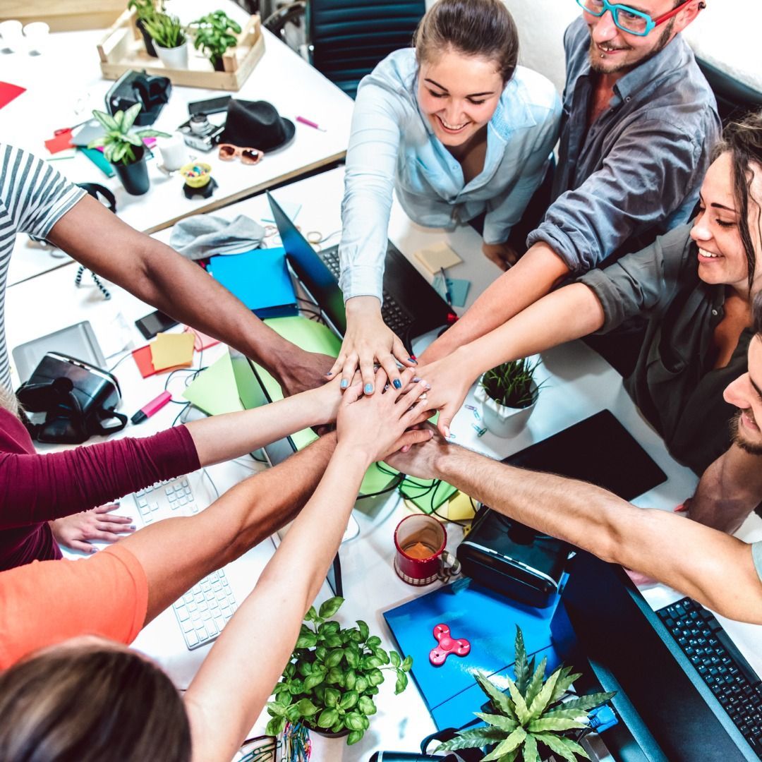 Team member colaboration optimizing Google Advertising strategies.