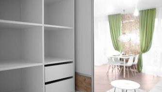 Picture of new storage space holding assorted compartment baskets.